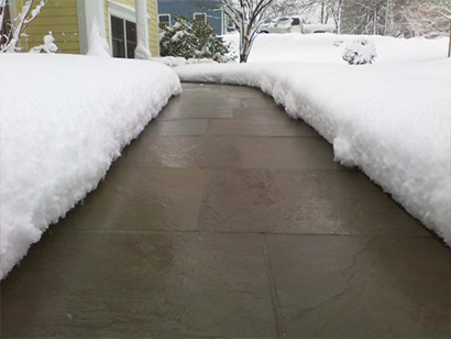 Heated paver sidewalk after a snowstorm.