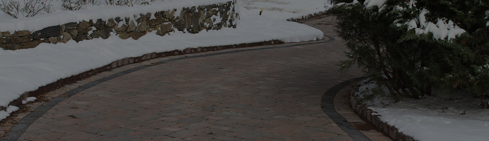 Heated paver driveway banner